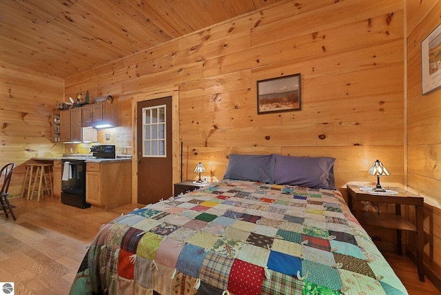 405 E Shetland Trl, Cedar, MI 49621 - bedroom with light wood-style flooring, wooden walls, and wood ceiling