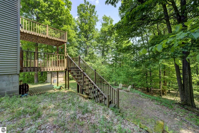 3721 W 18th Rd, Mesick, MI 49668 - view of yard with stairway and a wooden deck