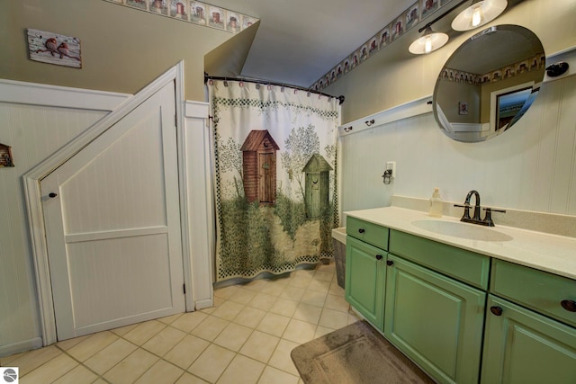 3721 W 18th Rd, Mesick, MI 49668 - full bath with tile patterned floors, vanity, a shower with curtain, and a decorative wall