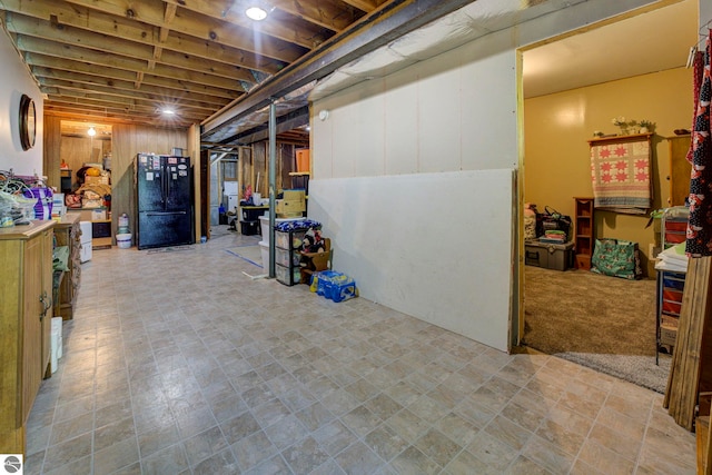 3721 W 18th Rd, Mesick, MI 49668 - below grade area featuring freestanding refrigerator