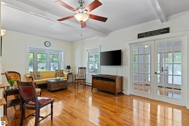 1740 Setterbo Rd, Suttons Bay, MI 49682 - living room featuring beamed ceiling, healthy amount of natural light, light wood-style flooring, ceiling fan, and french doors