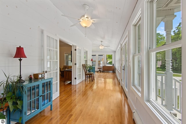 1740 Setterbo Rd, Suttons Bay, MI 49682 - sunroom featuring french doors and wood finished floors