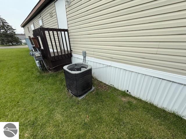 7372 Clans St, Alma, MI 48801 - exterior view of a cooling unit