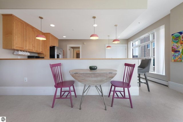 141 Rivers Edge Dr Unit 310, Traverse City, MI 49684 - dining area with baseboard heating, light carpet, and recessed lighting