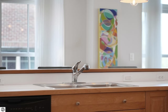 141 Rivers Edge Dr Unit 310, Traverse City, MI 49684 - kitchen with dishwasher and light countertops