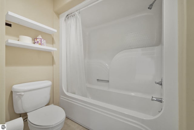 141 Rivers Edge Dr Unit 310, Traverse City, MI 49684 - bathroom featuring shower / tub combo and tile patterned flooring