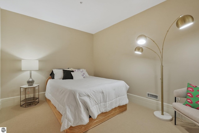 141 Rivers Edge Dr Unit 310, Traverse City, MI 49684 - carpeted bedroom featuring baseboards