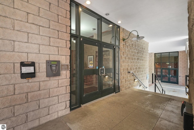 141 Rivers Edge Dr Unit 310, Traverse City, MI 49684 - view of exterior entry with french doors
