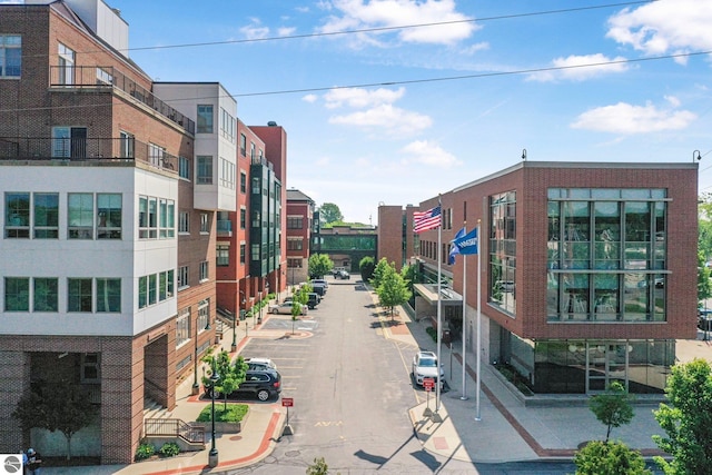 141 Rivers Edge Dr Unit 310, Traverse City, MI 49684 - view of asphalt road with sidewalks and curbs