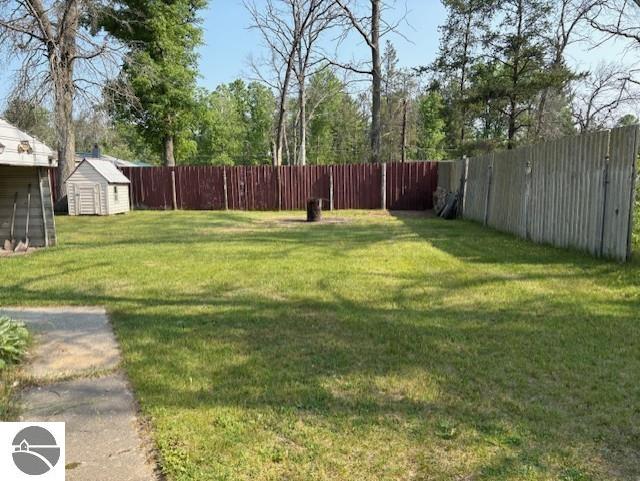 4161 Elbow Lake Rd, Prescott, MI 48756 - view of yard featuring a storage unit