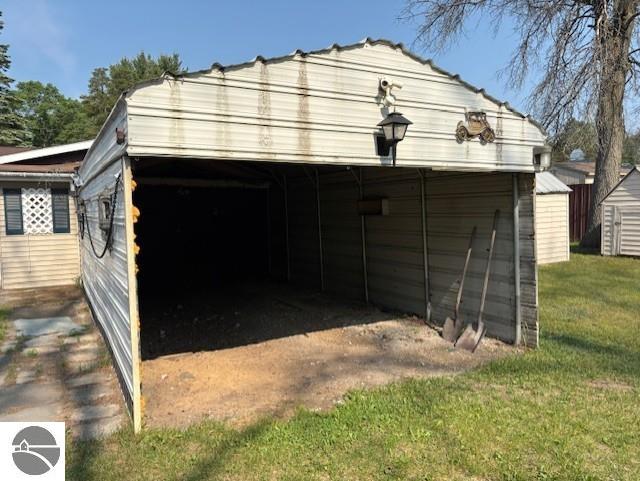 4161 Elbow Lake Rd, Prescott, MI 48756 - garage with a shed
