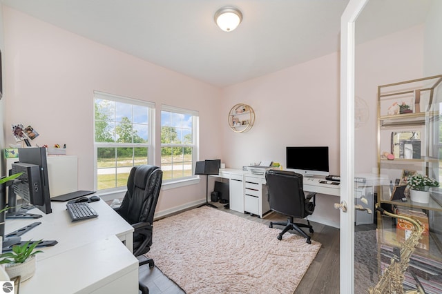 3468 Kali Ln, Alma, MI 48801 - office area with light wood-style flooring and baseboards