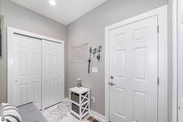3468 Kali Ln, Alma, MI 48801 - foyer entrance featuring light marble finish floors and recessed lighting