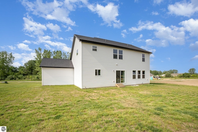 3468 Kali Ln, Alma, MI 48801 - rear view of property with entry steps and a yard