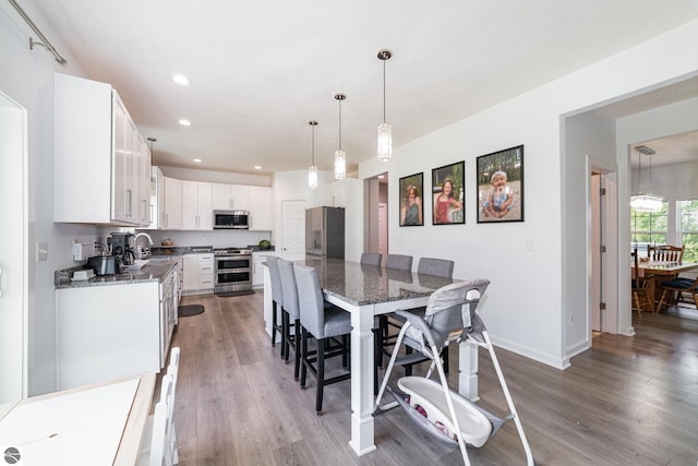 3468 Kali Ln, Alma, MI 48801 - dining space with light wood-style flooring and recessed lighting