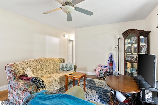 2733 Windcrest Ln, Traverse City, MI 49686 - living area featuring wood finished floors and ceiling fan