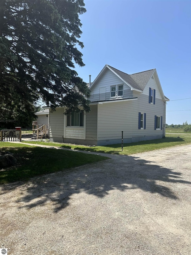 1339 S Melita Rd, Sterling, MI 48659 - view of home's exterior with gravel driveway and crawl space