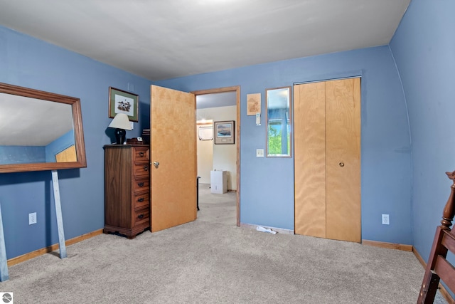 9420 E Traverse Hwy, Traverse City, MI 49684 - unfurnished bedroom with carpet floors and a closet