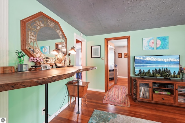 821 Indian Trail Blvd, Traverse City, MI 49686 - bar area featuring wood-type flooring and baseboards