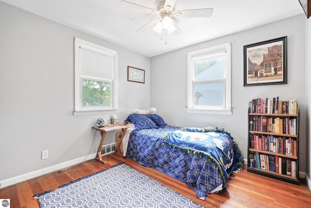 821 Indian Trail Blvd, Traverse City, MI 49686 - bedroom featuring wood-type flooring and a ceiling fan