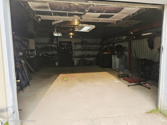 622 W Houghton Lake Rd, Lake City, MI 49651 - below grade area with a garage and fridge