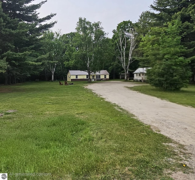 622 W Houghton Lake Rd, Lake City, MI 49651 - view of community with dirt driveway and a lawn