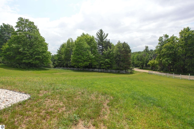 8124 Crisp Rd, Williamsburg, MI 49690 - view of yard with a rural view and a view of trees