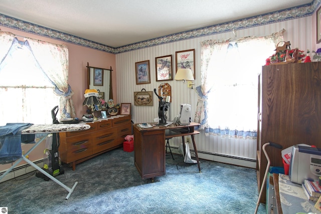 8124 Crisp Rd, Williamsburg, MI 49690 - carpeted office space with wallpapered walls, a baseboard radiator, and healthy amount of natural light