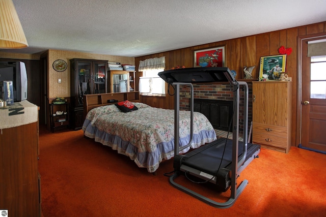 8124 Crisp Rd, Williamsburg, MI 49690 - bedroom featuring light colored carpet, a textured ceiling, and wooden walls