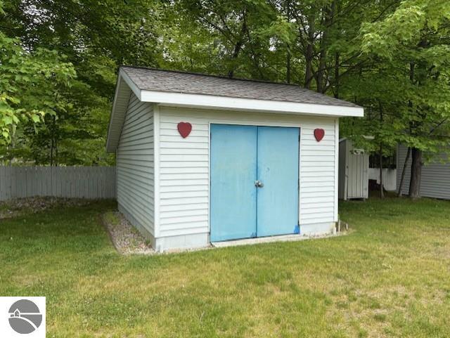 2615 Antelope Trl, West Branch, MI 48661 - view of shed with view of scattered trees