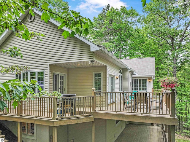 4180 Pintail Dr, Traverse City, MI 49696 - back of house featuring a wooden deck