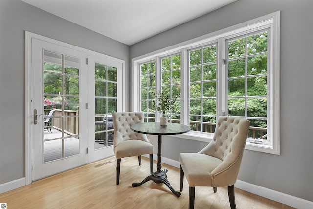 4180 Pintail Dr, Traverse City, MI 49696 - dining space featuring healthy amount of natural light and light wood finished floors