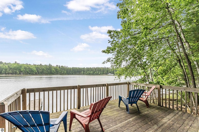 4180 Pintail Dr, Traverse City, MI 49696 - wooden terrace with a water view and a forest view