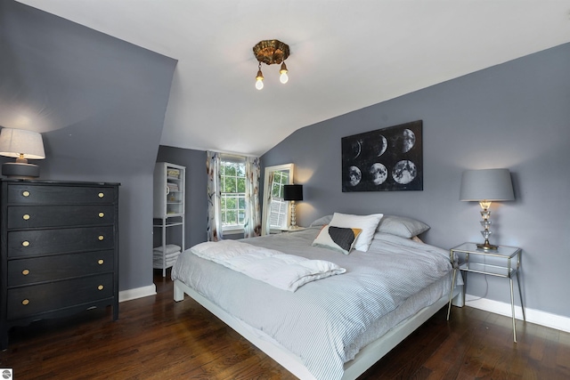 701 Sixth St, Traverse City, MI 49684 - bedroom featuring lofted ceiling and wood finished floors