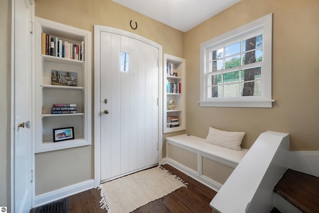 701 Sixth St, Traverse City, MI 49684 - entrance foyer with dark wood-type flooring and plenty of natural light