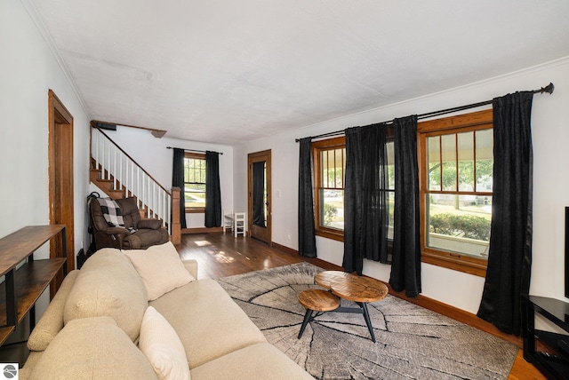 311 E Bennett Ave, Mount Pleasant, MI 48858 - living area with stairs, wood finished floors, and crown molding