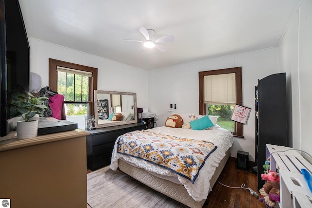 311 E Bennett Ave, Mount Pleasant, MI 48858 - bedroom featuring wood finished floors and a ceiling fan