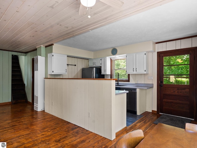 10090 E 48th Rd, Cadillac, MI 49601 - kitchen with freestanding refrigerator, dishwasher, a heating unit, dark wood finished floors, and a peninsula