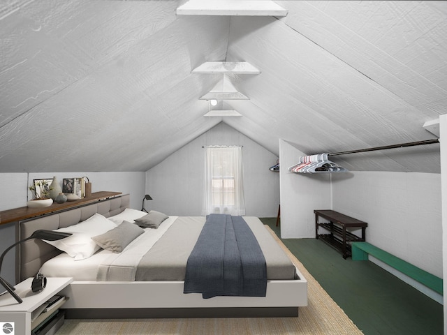 10090 E 48th Rd, Cadillac, MI 49601 - bedroom featuring lofted ceiling and wood finished floors