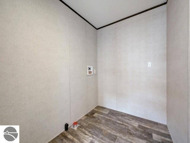 11399 Union St, Fife Lake, MI 49633 - unfurnished room with wood finished floors