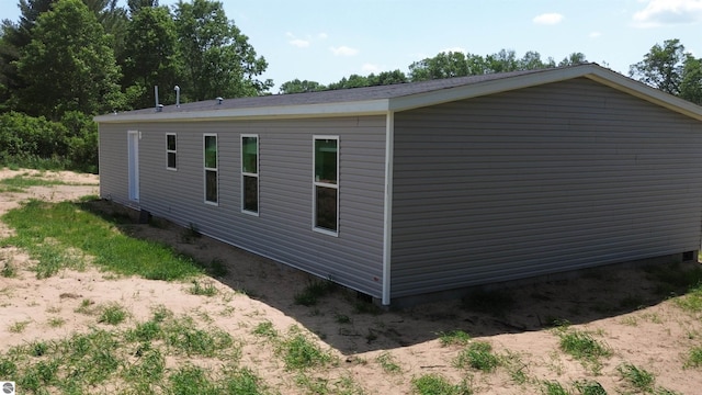 11399 Union St, Fife Lake, MI 49633 - view of side of home