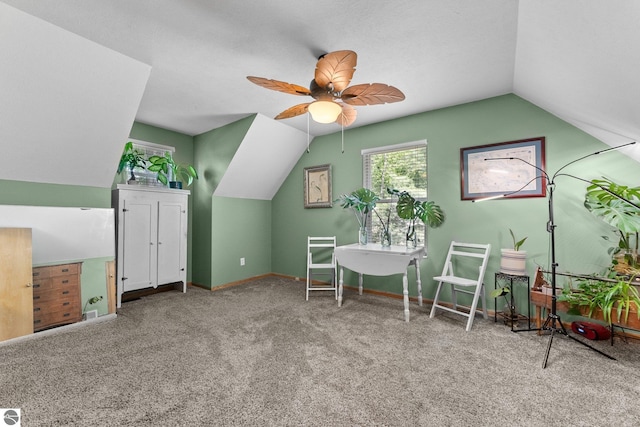 2491 Holland Cir, Traverse City, MI 49685 - sitting room with vaulted ceiling, a ceiling fan, and carpet
