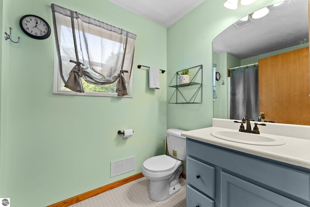 2491 Holland Cir, Traverse City, MI 49685 - bathroom with vanity, tile patterned floors, and curtained shower