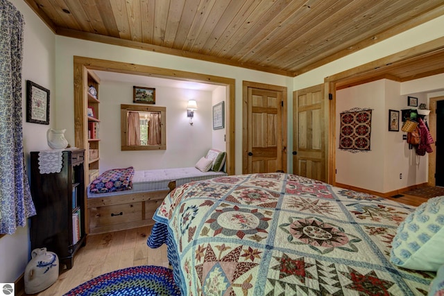 4079 E Oxford Dr, Leland, MI 49654 - bedroom with light wood-style floors, ornamental molding, and wood ceiling