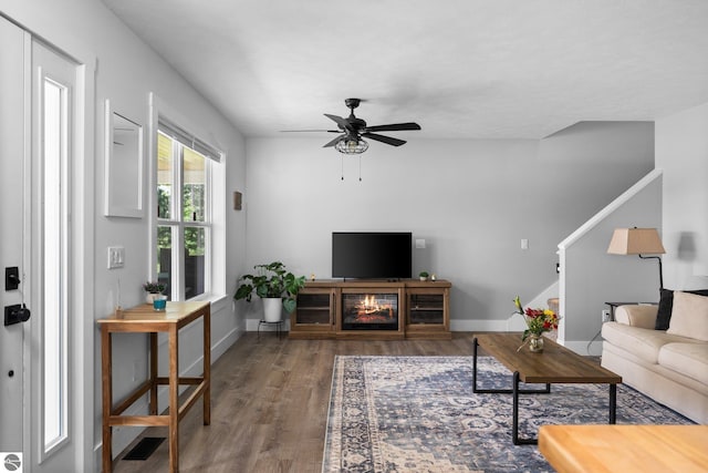 6330 Lund Rd SW, Fife Lake, MI 49633 - living area featuring ceiling fan and wood finished floors