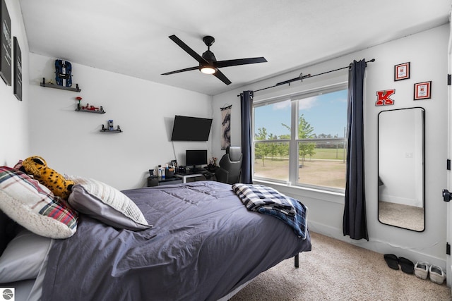 6330 Lund Rd SW, Fife Lake, MI 49633 - carpeted bedroom with ceiling fan