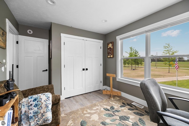 6330 Lund Rd SW, Fife Lake, MI 49633 - home office featuring wood finished floors and recessed lighting