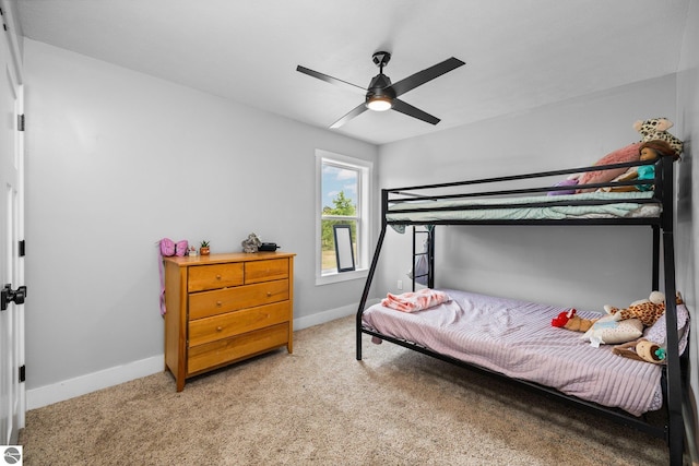 6330 Lund Rd SW, Fife Lake, MI 49633 - bedroom with light colored carpet and ceiling fan