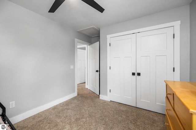 6330 Lund Rd SW, Fife Lake, MI 49633 - unfurnished bedroom featuring carpet floors, a closet, and a ceiling fan