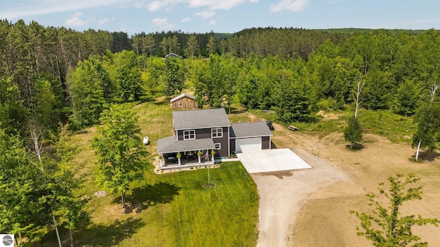 6330 Lund Rd SW, Fife Lake, MI 49633 - view of subject property with a heavily wooded area